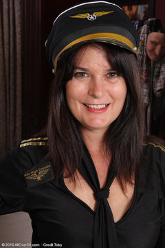 Captain Sherry Lee is ready to takeoff her clothes