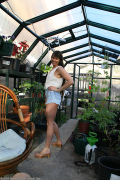Hairy pussied Vixen decides a greenhouse is a perfect place to play