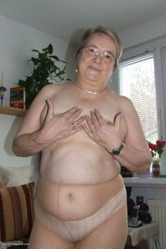 Granny takes off all of her clothes and starts playing