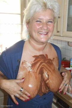Big titted mama covered in chocolate