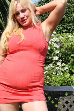 British housewife getting sun tanned in the garden