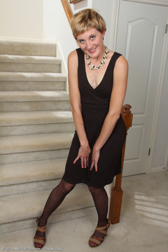 Petite and mature Katrina Mathews  spreading her legs on the stairs