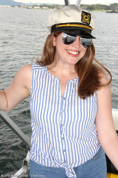Busty captain Holly Fuller on the boat