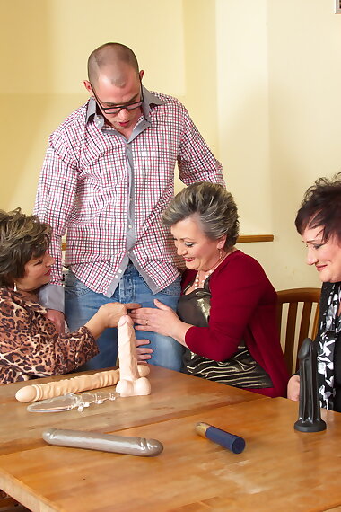 Three mature ladies playing around with one lucky guy